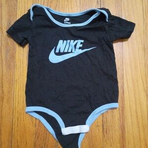 Nike Kids Bodysuit in Black with Blue Trim